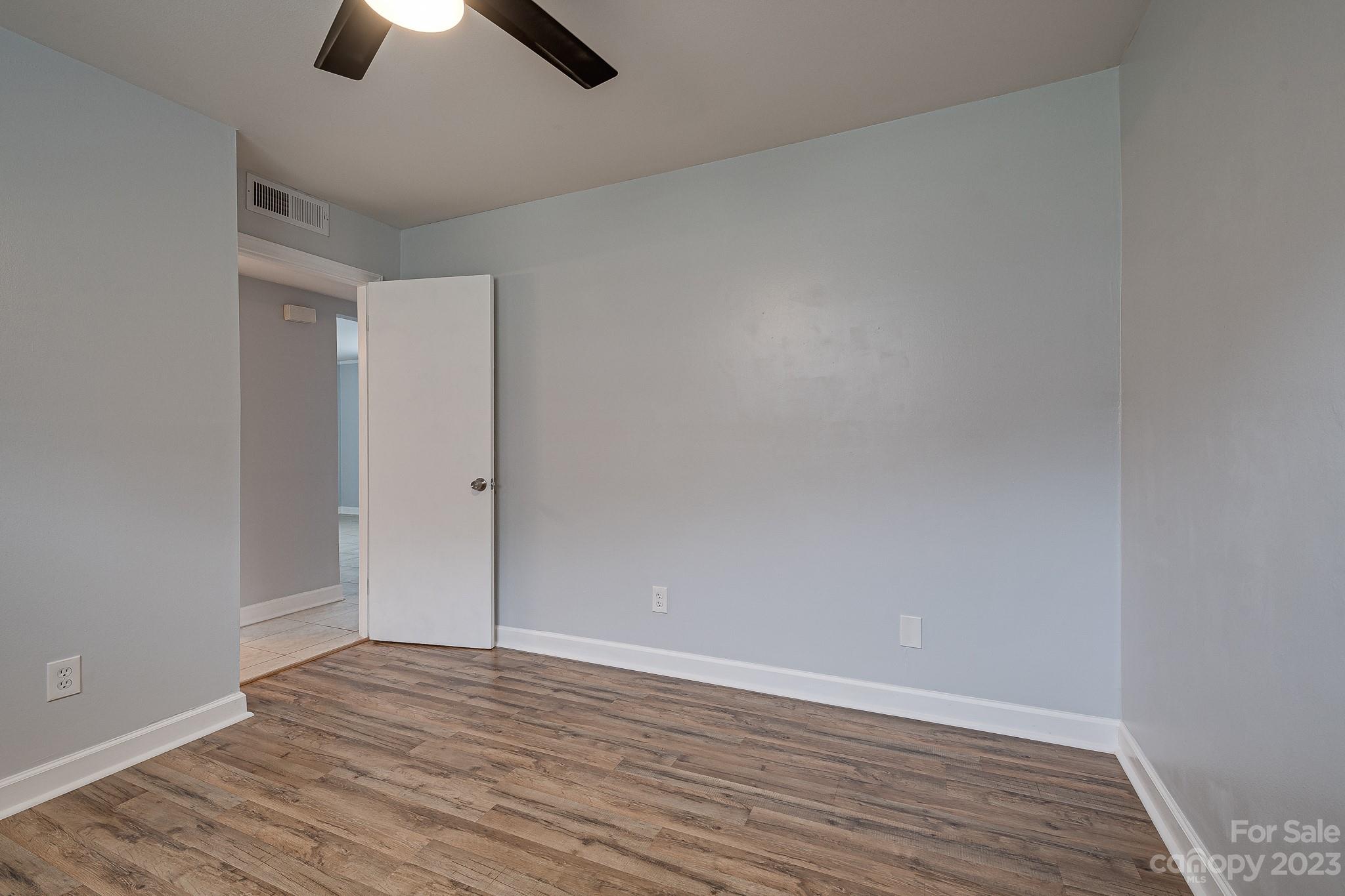910 McAlway Road, Unit B Charlotte, NC 28211 - Photo 31 of 37 wooden floor in an empty room