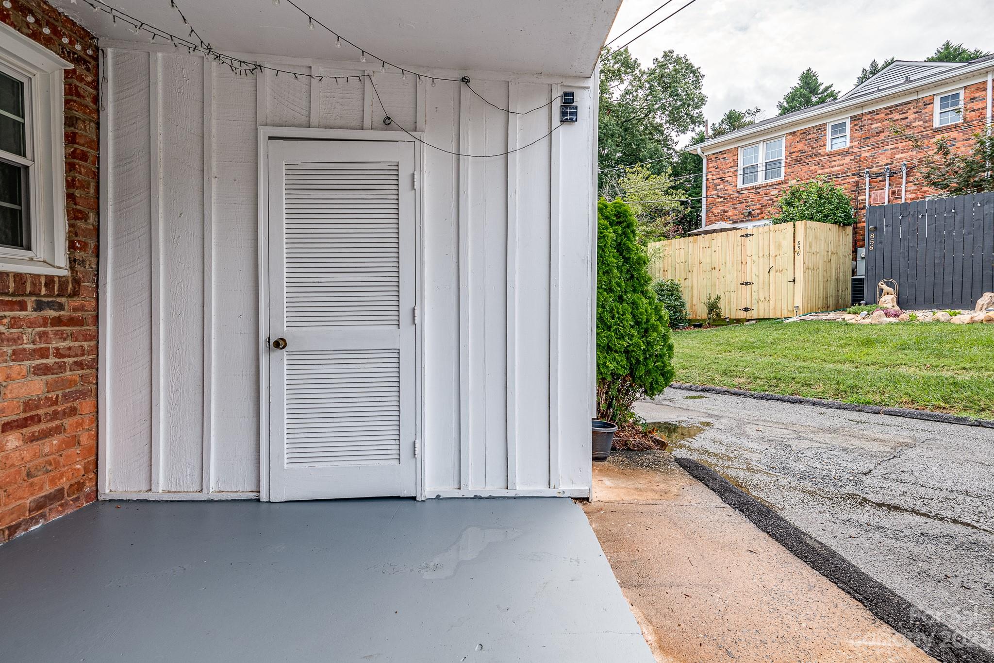 910 McAlway Road, Unit B Charlotte, NC 28211 - Photo 35 of 37 a view of a house with a outdoor space