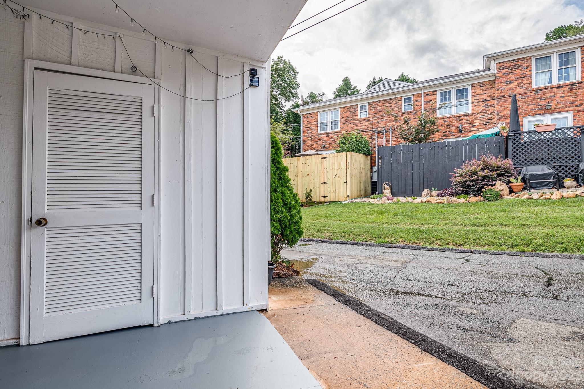 910 McAlway Road, Unit B Charlotte, NC 28211 - Photo 36 of 37 a view of a house with a yard
