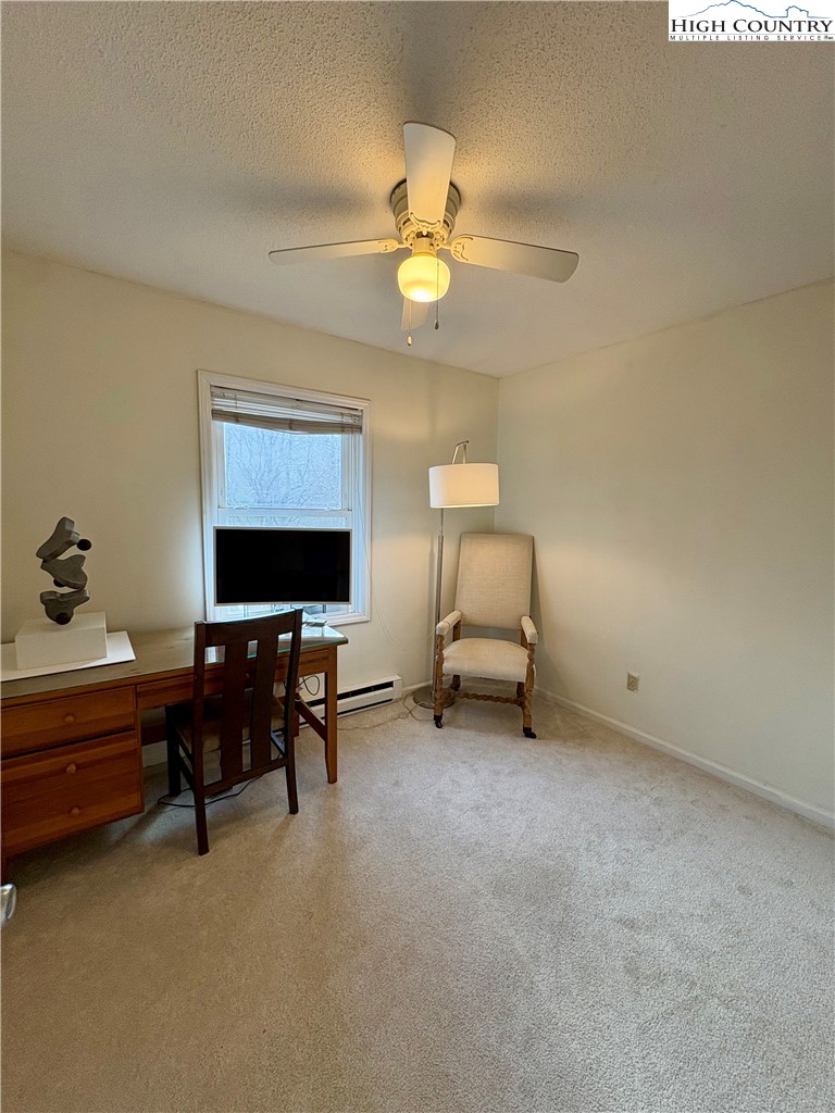 5416 Bamboo Road Boone, NC 28607 - Photo 14 of 35 a living room with furniture and a lamp