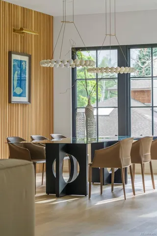 a table and chairs in a balcony