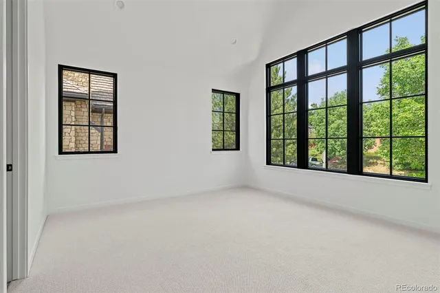 an empty room with windows