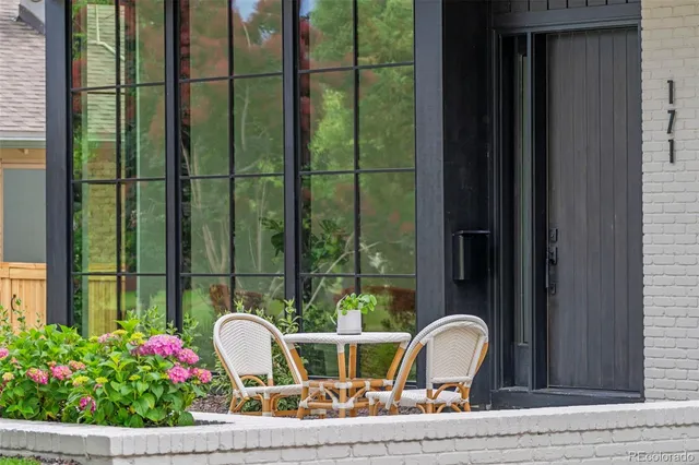 a house view with outdoor seating space
