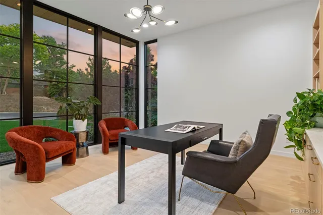 a view of a livingroom with furniture and window