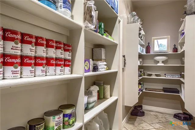 a room with storage and utility