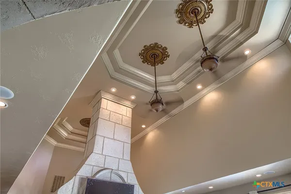 a view of a livingroom with a ceiling fan