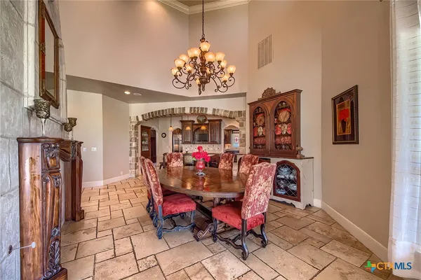 a view of a dining room with furniture