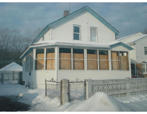 71 James Street Springfield, MA 01105 - Photo 1 of 1 a front view of a house with a yard
