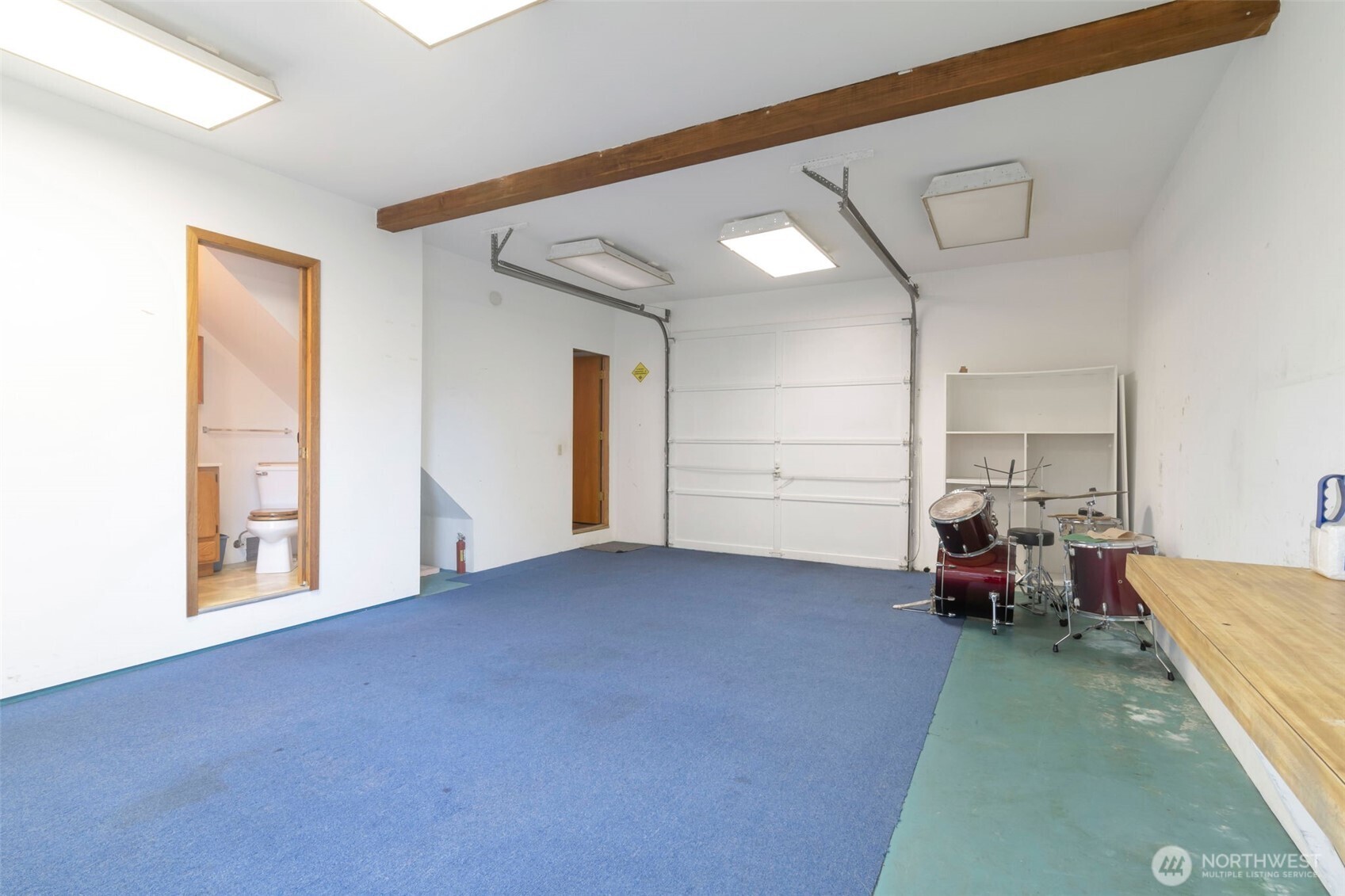 308 225th Street Southwest Bothell, WA 98021 - Photo 13 of 15 a view of a bedroom with furniture and a potted plant