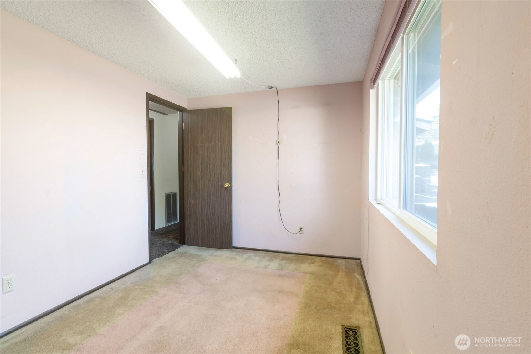 308 225th Street Southwest Bothell, WA 98021 - Photo 10 of 15 a view of an empty room with a window
