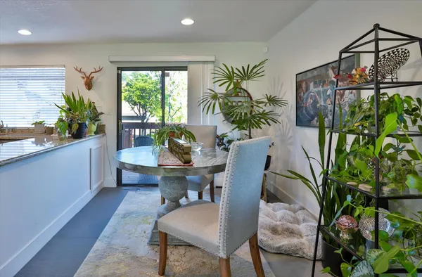 a bedroom with a bed and a television