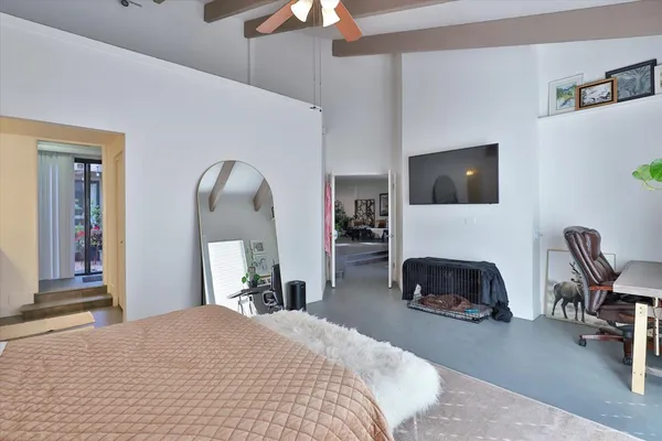 a view of a backyard with sitting area