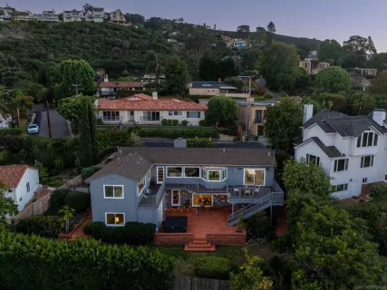 an aerial view of house with yard swimming pool and mountain view