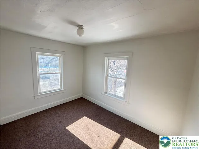 a bathroom with a sink a toilet and a bathtub