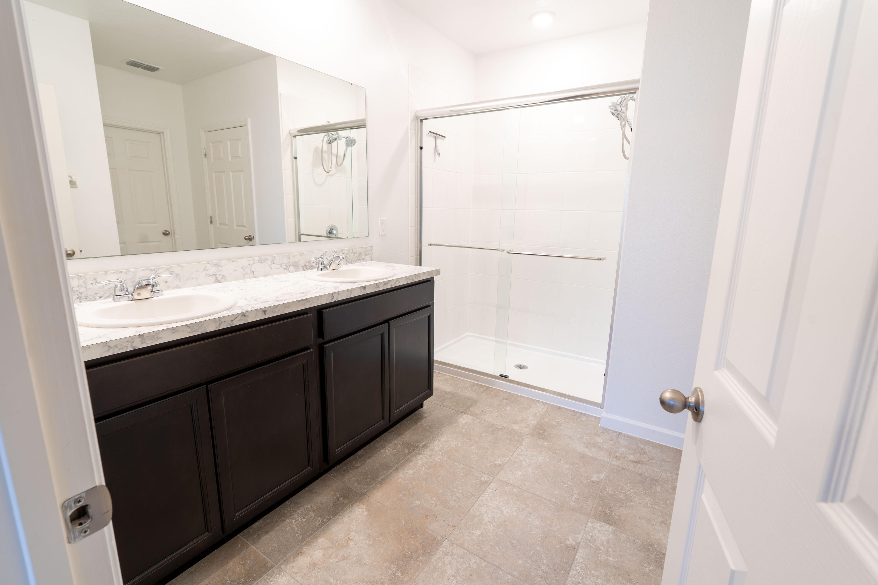 1401 Southeast Portillo Road Port St. Lucie, FL 34952 - Photo 20 of 37 a bathroom with a granite countertop sink mirror and a