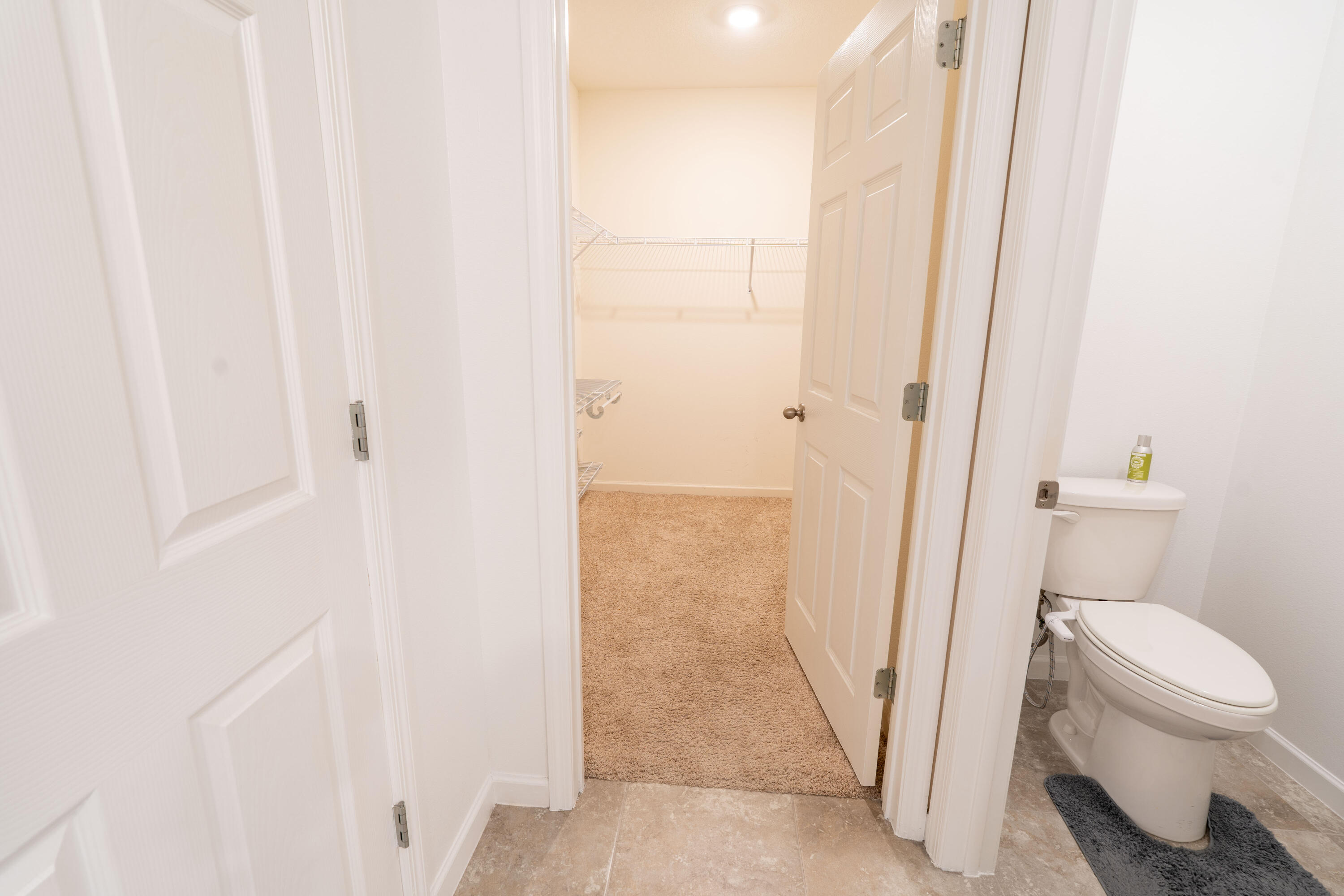 1401 Southeast Portillo Road Port St. Lucie, FL 34952 - Photo 21 of 37 a bathroom with a toilet and a shower