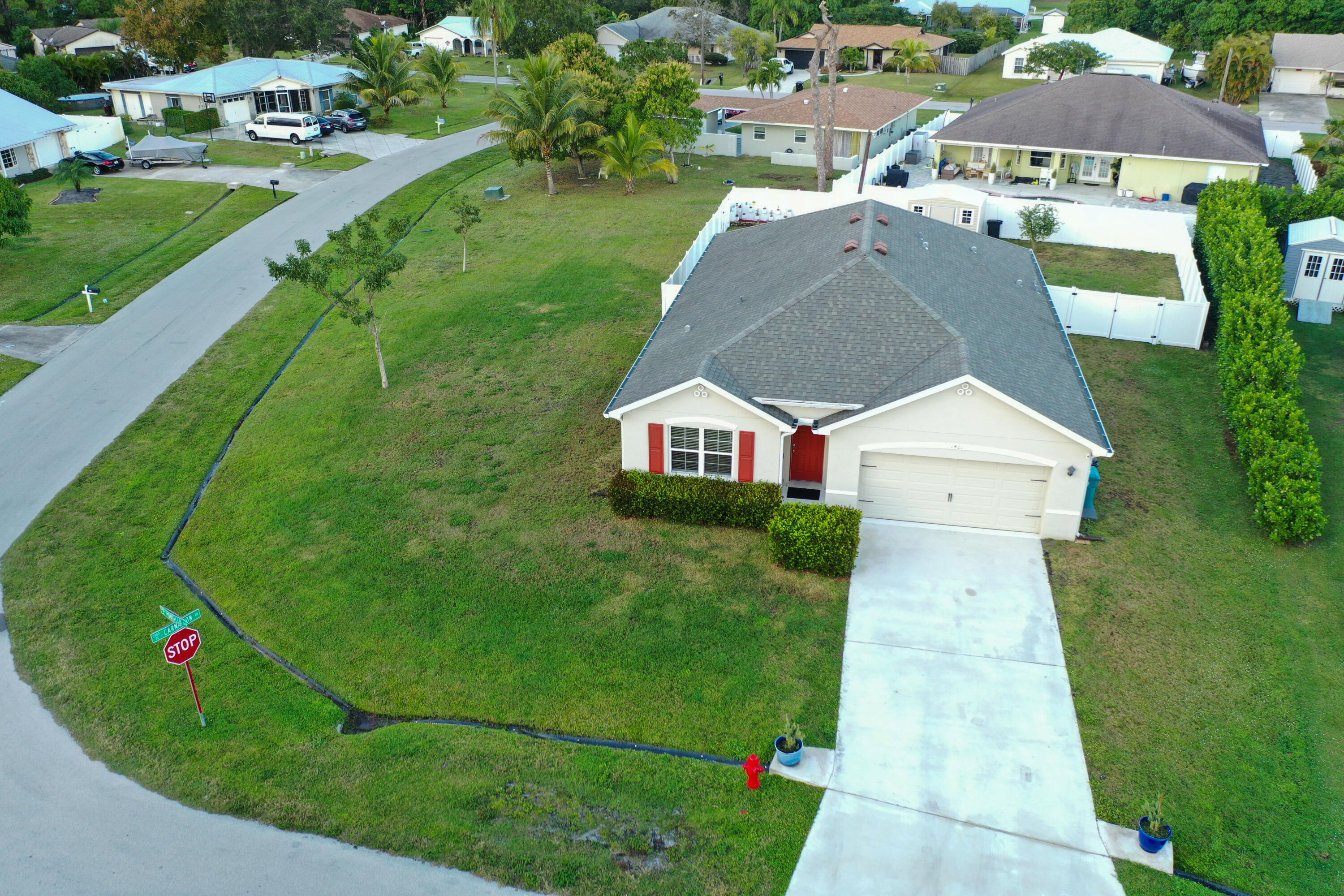 1401 Southeast Portillo Road Port St. Lucie, FL 34952 - Photo 36 of 37 a aerial view of a house