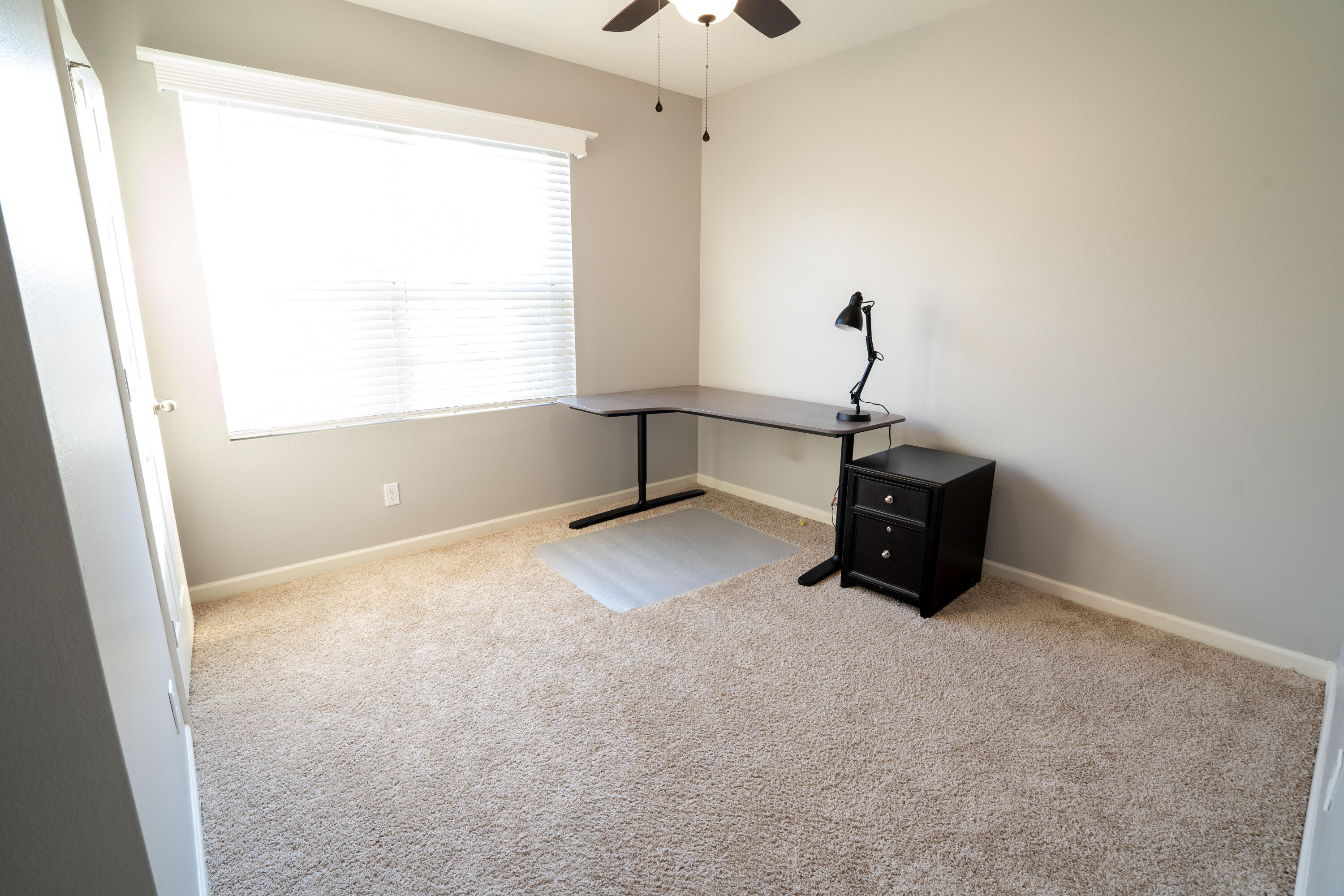 1401 Southeast Portillo Road Port St. Lucie, FL 34952 - Photo 4 of 37 an empty room with a window