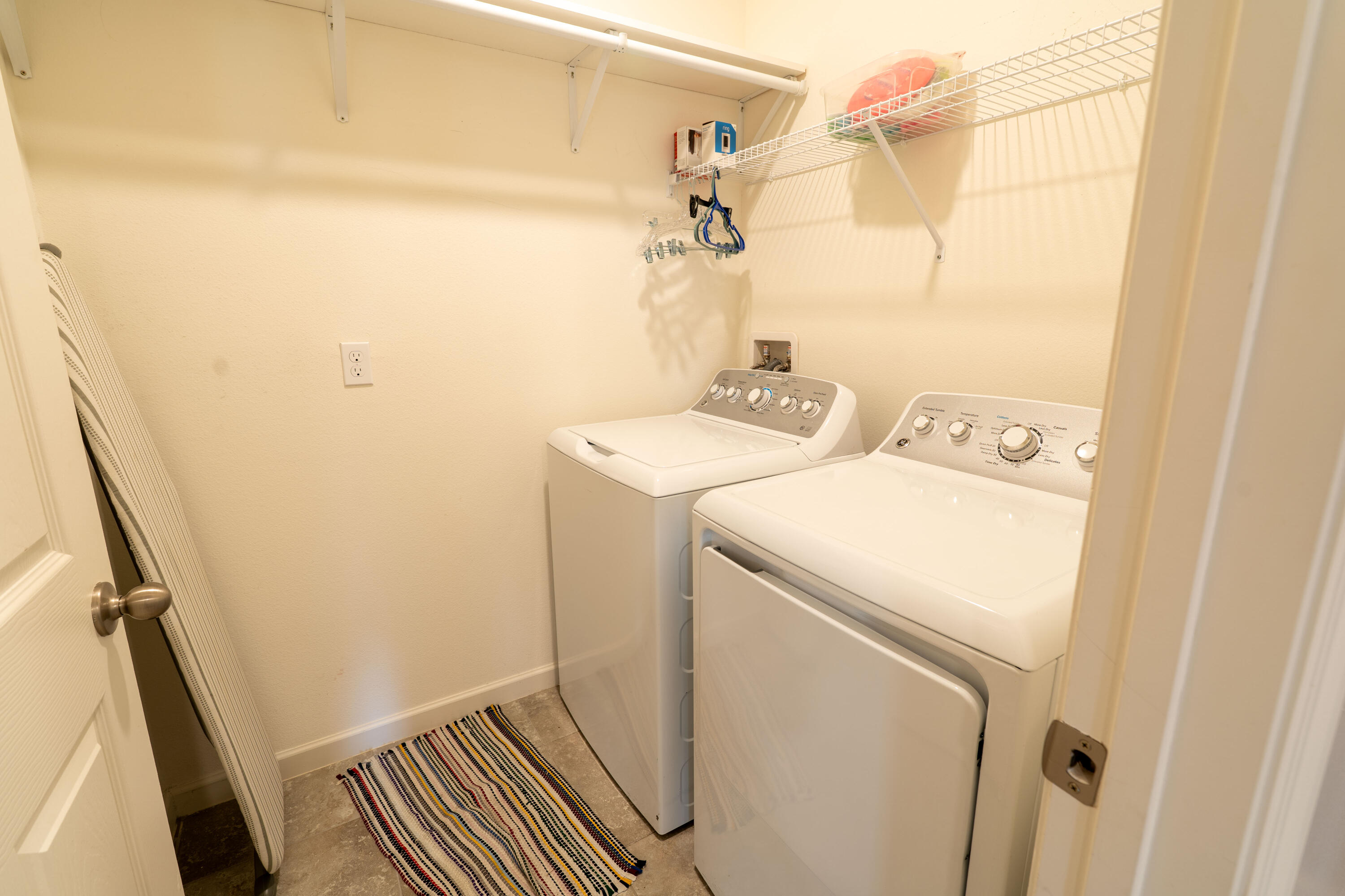 1401 Southeast Portillo Road Port St. Lucie, FL 34952 - Photo 10 of 37 a utility room with dryer and washer