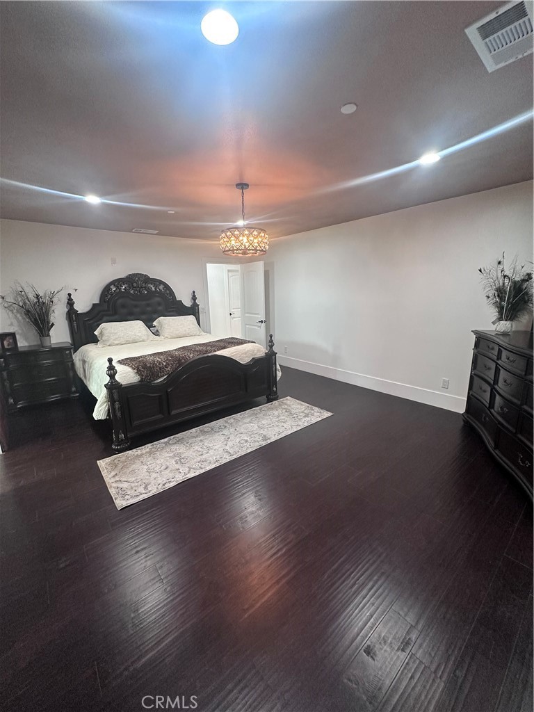 14426 Tumbleweed Road Phelan, CA 92371 - Photo 17 of 38 a view of livingroom with furniture and wooden floor