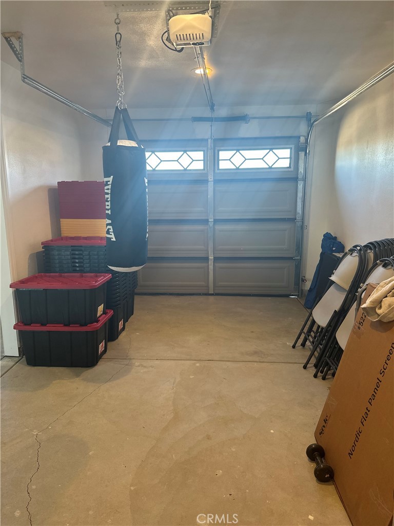 14426 Tumbleweed Road Phelan, CA 92371 - Photo 35 of 38 a view of a room with gym equipment