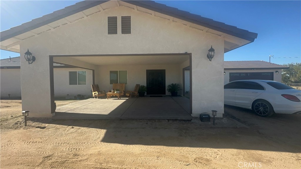 14426 Tumbleweed Road Phelan, CA 92371 - Photo 5 of 38 a view of a car garage