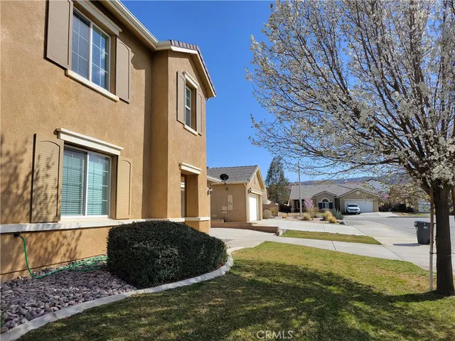 a kitchen with kitchen island granite countertop a sink and a counter top space