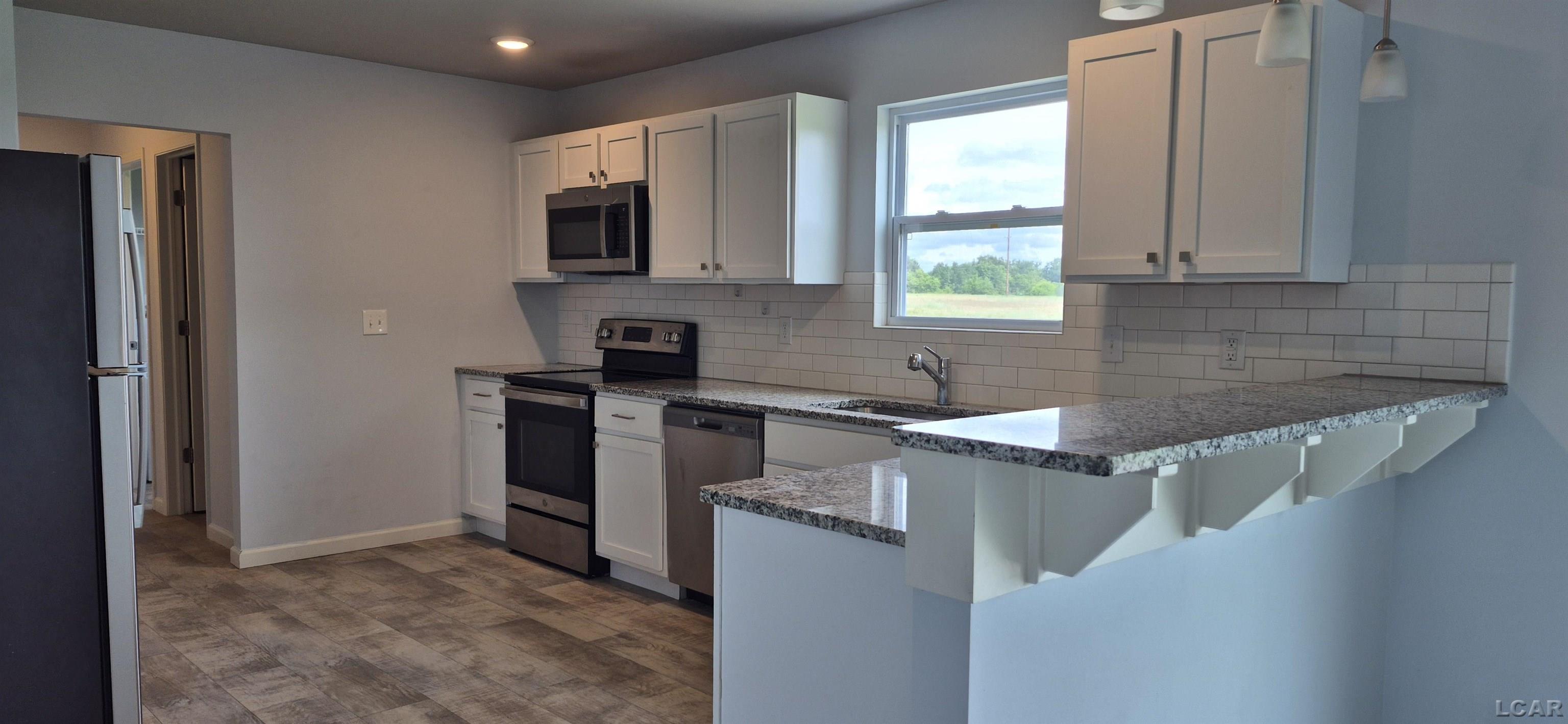 3284 Sutton Road Tecumseh, MI 49286 - Photo 3 of 26