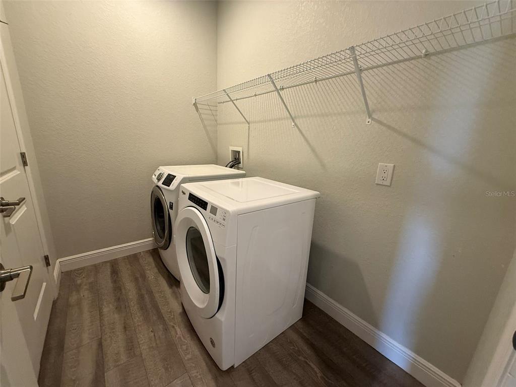 26265 Explorer Road Punta Gorda, FL 33983 - Photo 13 of 15 a utility room with dryer and washer