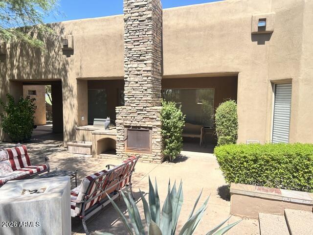 38601 North Rising Sun Road Carefree, AZ 85377 - Photo 33 of 35 Backyard Fireplace