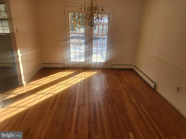 a view of a kitchen with electric appliances