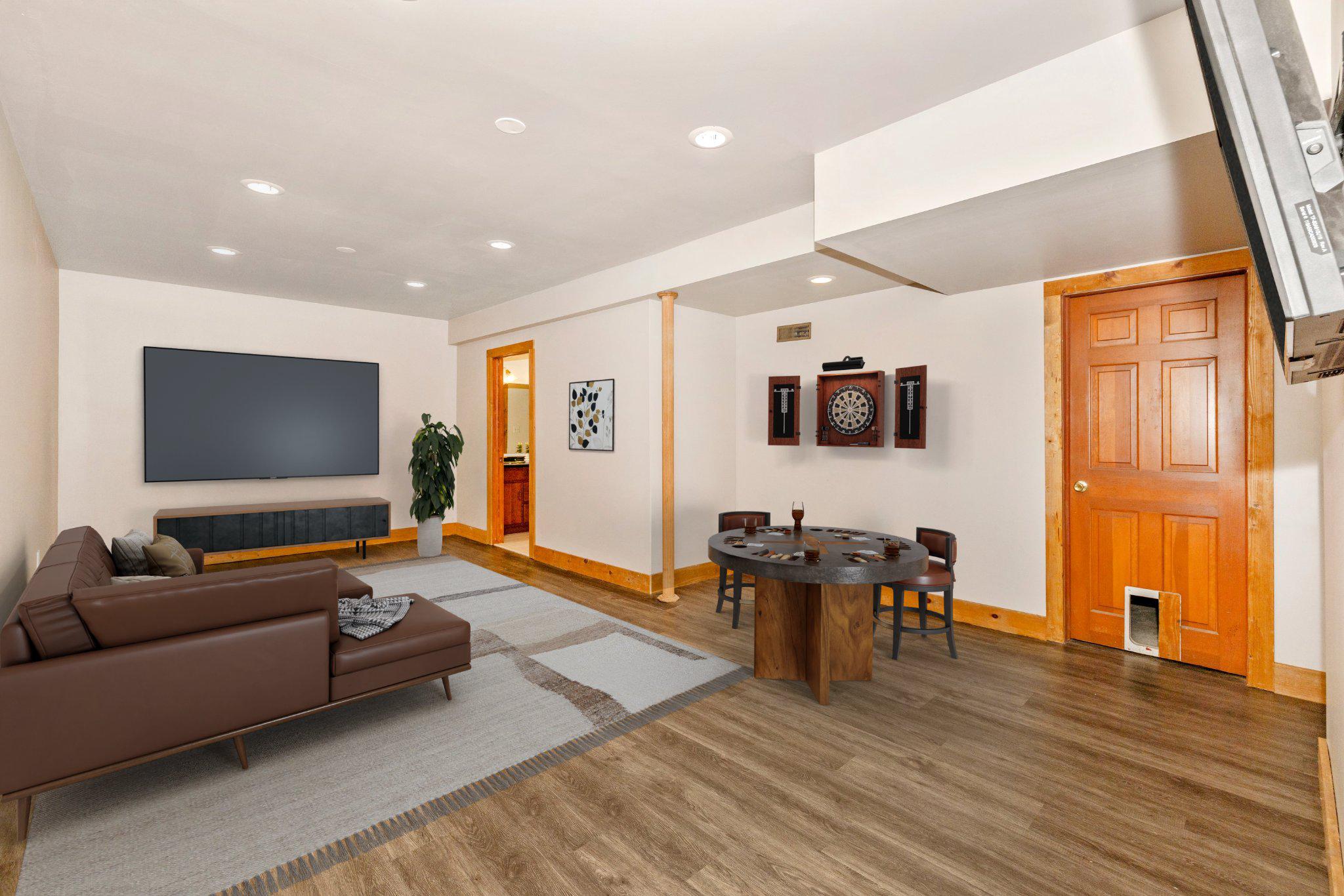 6838 Mountain Church Road Middletown, MD 21769 - Photo 33 of 55 a living room with furniture flat screen tv and wooden floor