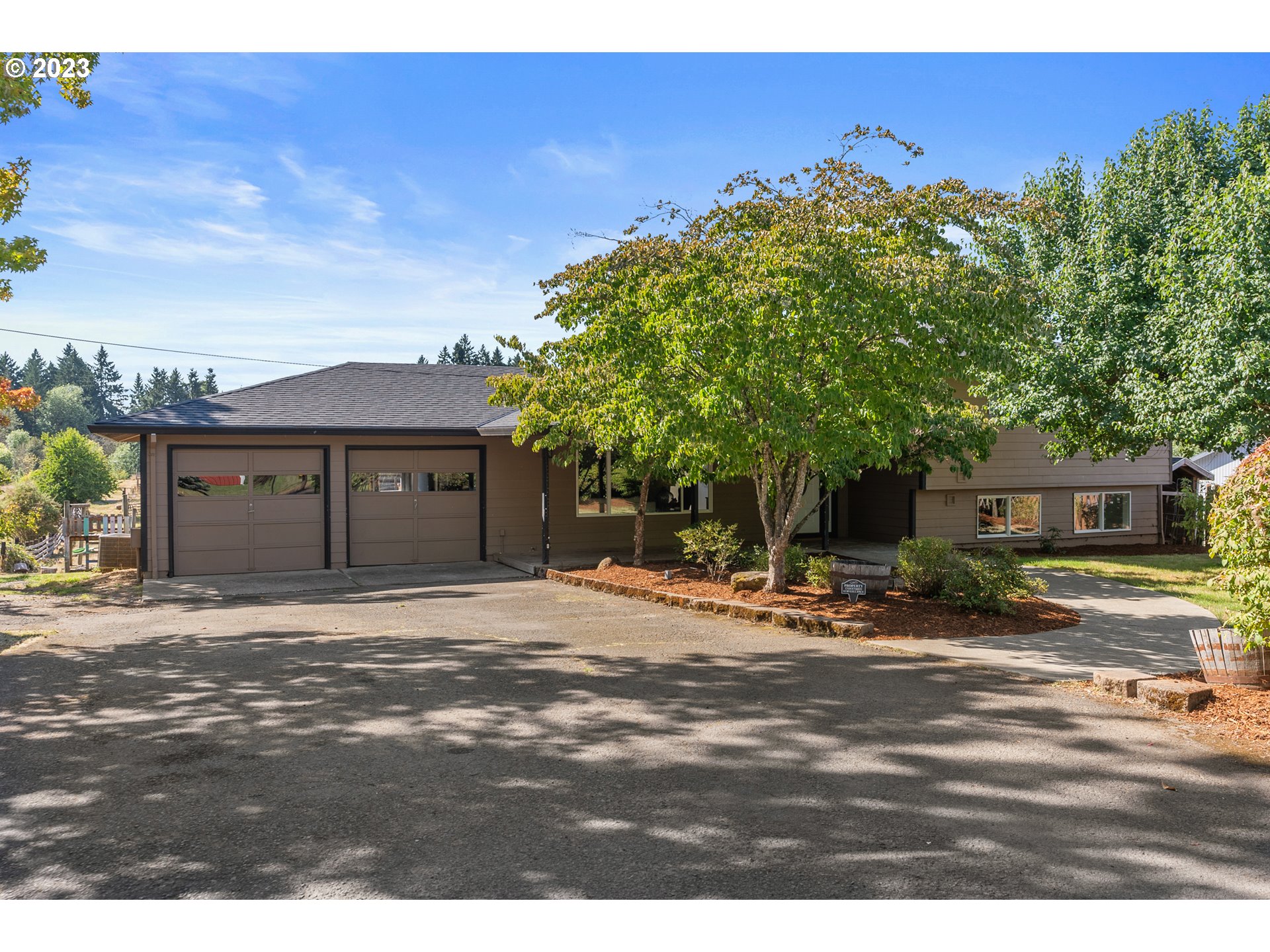 31170 Southwest Firdale Road Cornelius, OR 97113 - Photo 1 of 46 a big room with wooden fence
