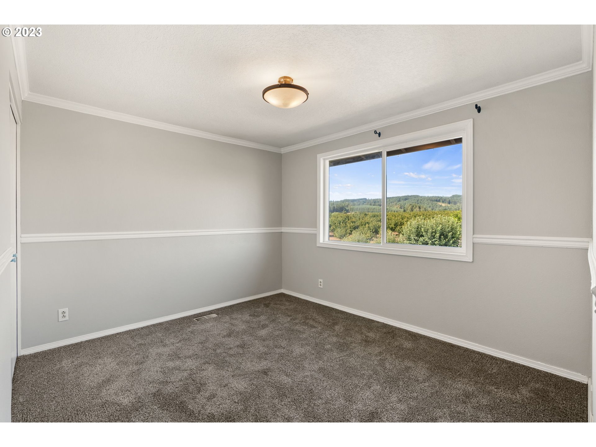 31170 Southwest Firdale Road Cornelius, OR 97113 - Photo 21 of 46 a view of an empty room with a window