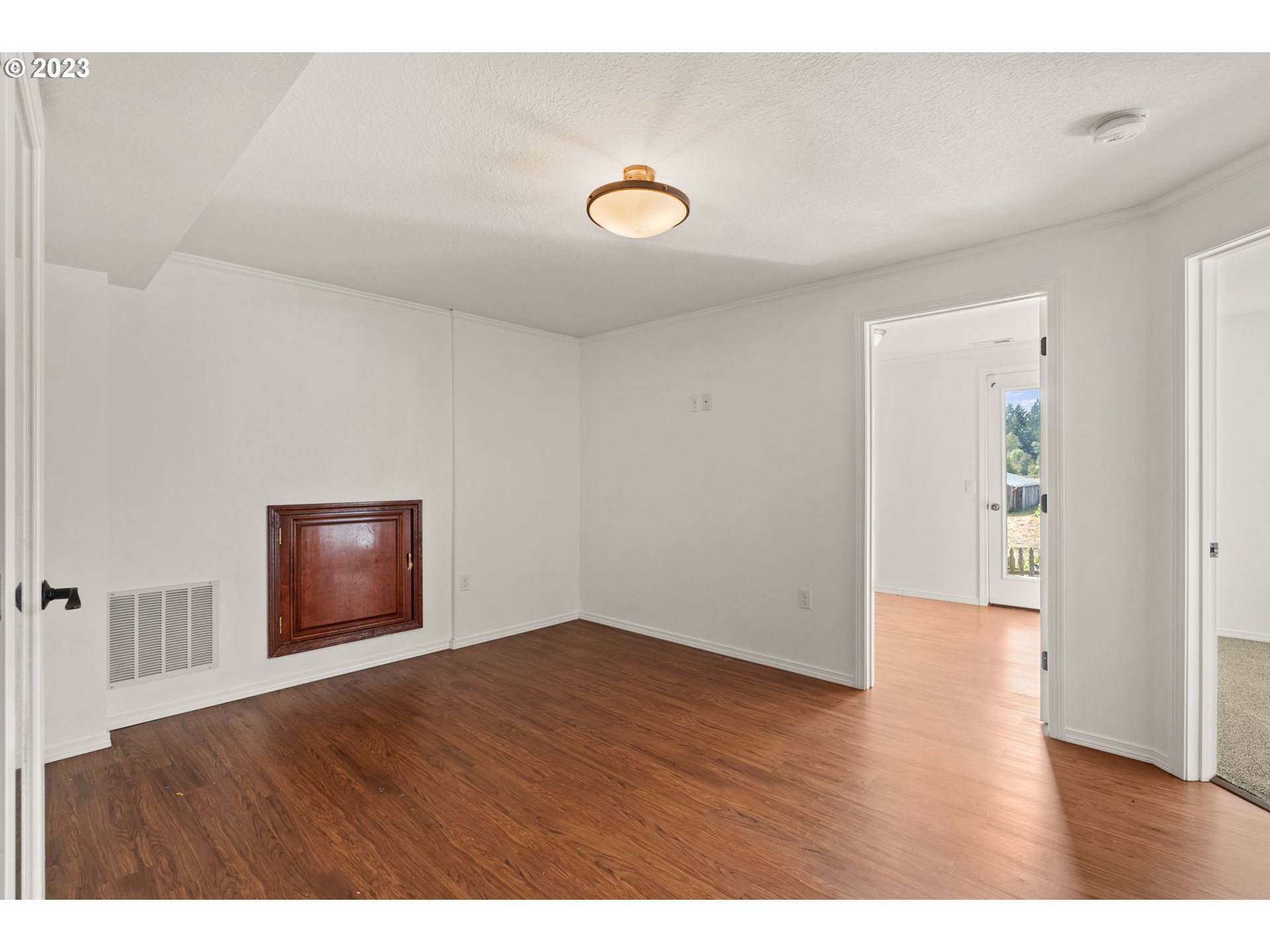 31170 Southwest Firdale Road Cornelius, OR 97113 - Photo 29 of 46 a view of an empty room and wooden floor