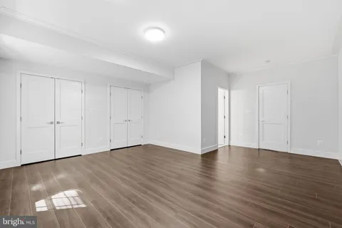 a view of a house with pool and a chairs