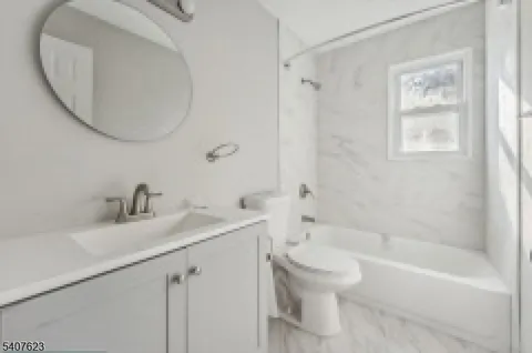 a view of a back yard of the house