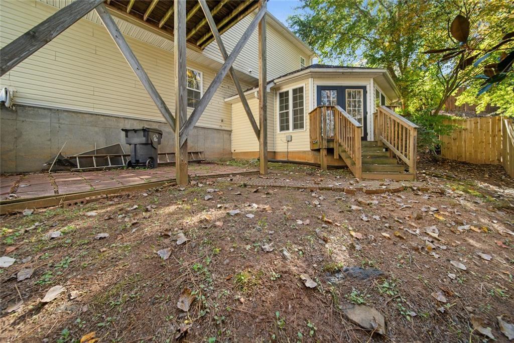 2140 Wildcat Cliffs Way Lawrenceville, GA 30043 - Photo 30 of 32 a view of a house with a yard