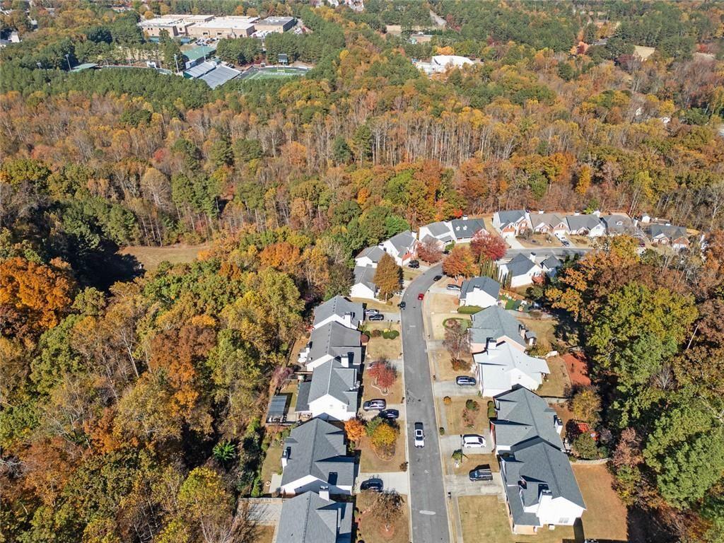 2140 Wildcat Cliffs Way Lawrenceville, GA 30043 - Photo 5 of 32 a city view with tall buildings