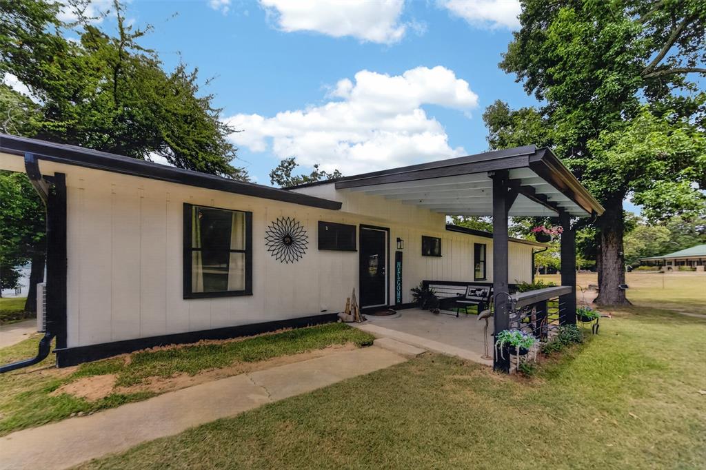 23363 Wateridge Loop Flint, TX 75762 - Photo 35 of 40 a view of a house with patio