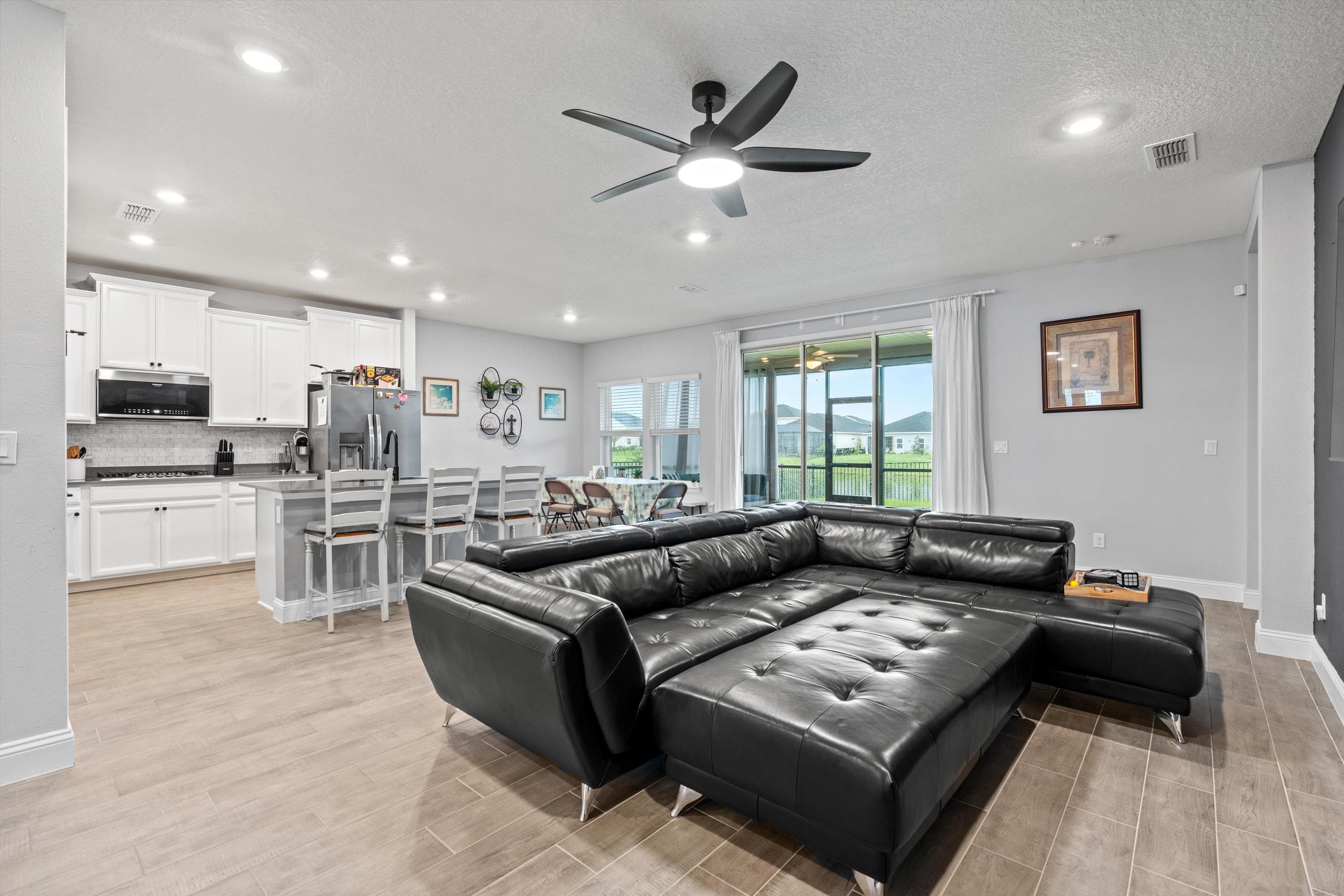 366 Varner Way St. Augustine, FL 32092 - Photo 11 of 50 a living room with furniture and kitchen view