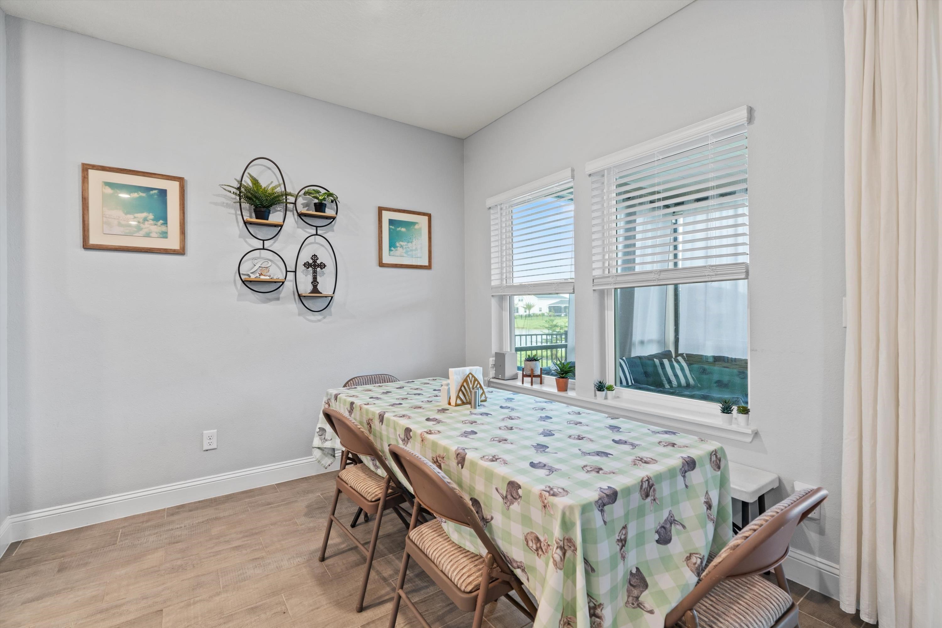 366 Varner Way St. Augustine, FL 32092 - Photo 14 of 50 a dining room with a table and chairs