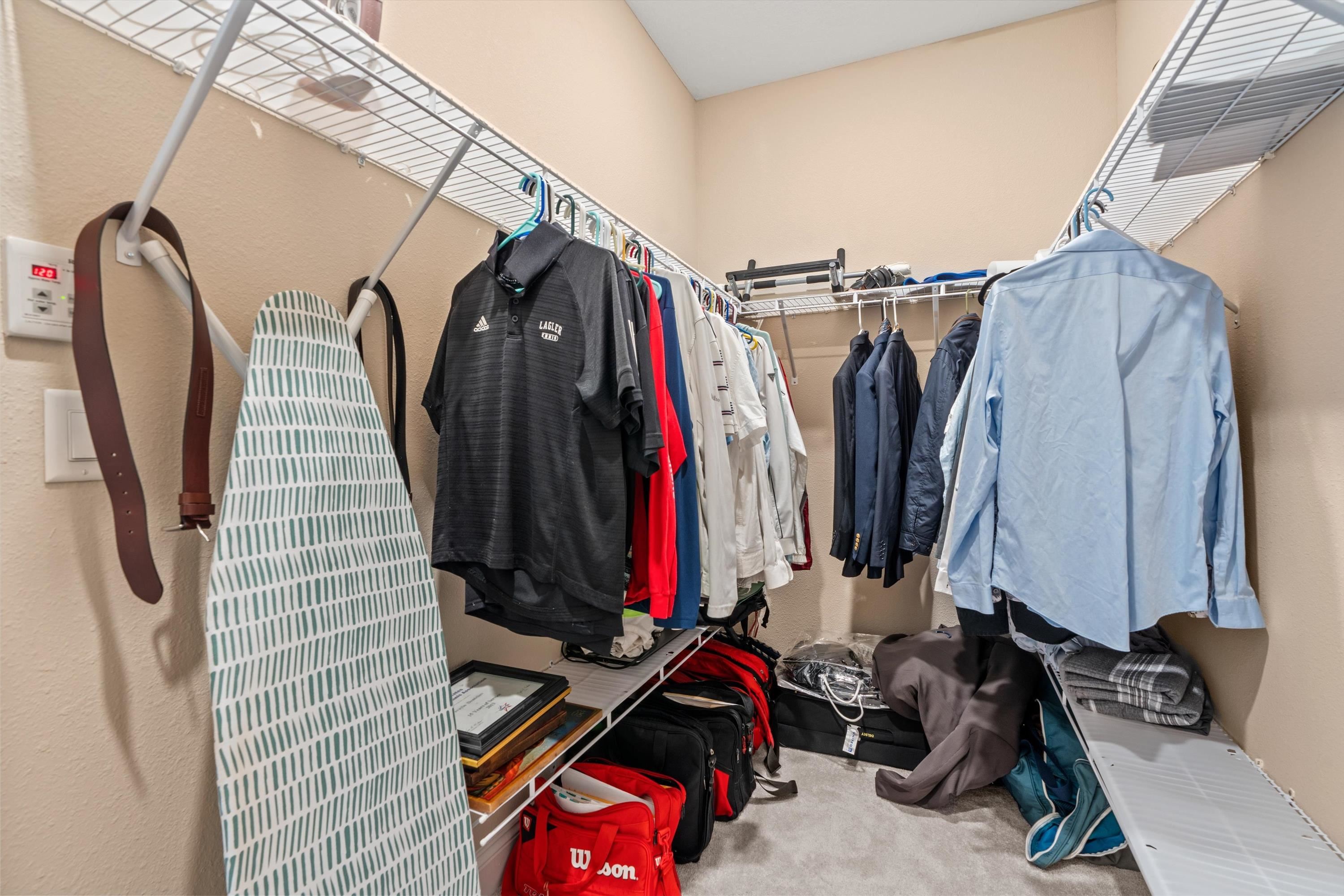 366 Varner Way St. Augustine, FL 32092 - Photo 19 of 50 a view of walk in closet with clothes and shoes