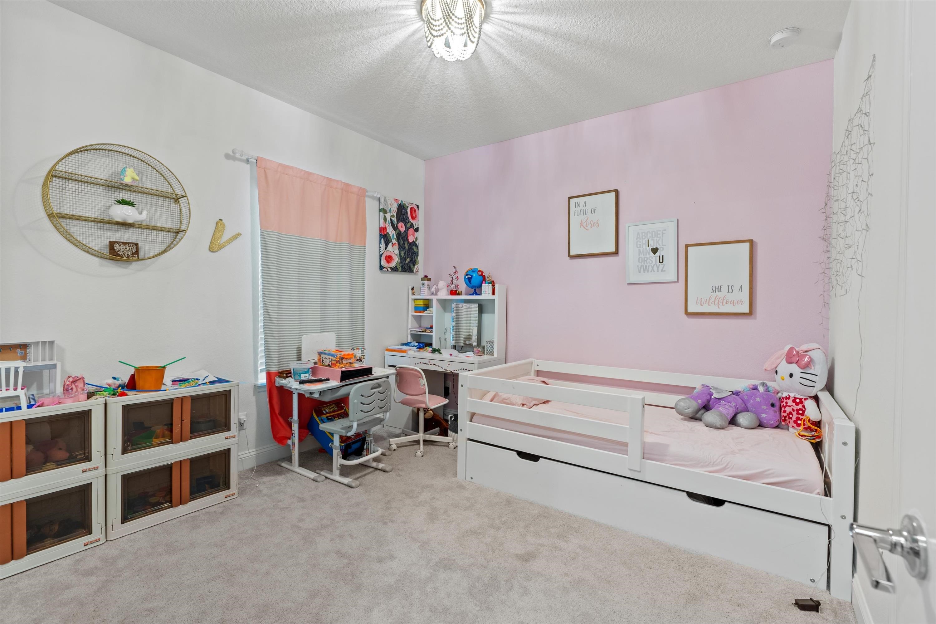 366 Varner Way St. Augustine, FL 32092 - Photo 20 of 50 a bedroom with furniture and a chandelier