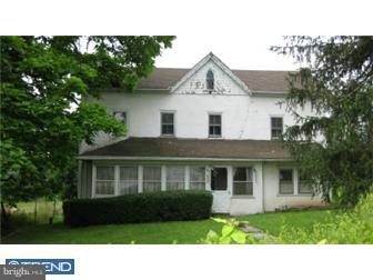 345 Bethel Road Spring City, PA 19475 - Photo 4 of 12 a front view of a house with a garden