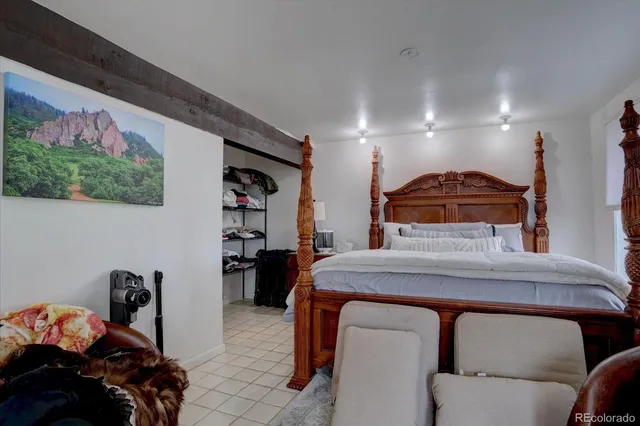 a bedroom with furniture and a bed