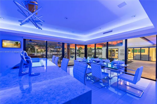 a view of a room with a large window