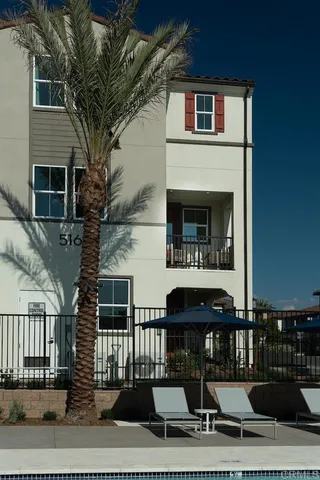 a front view of a house with balcony