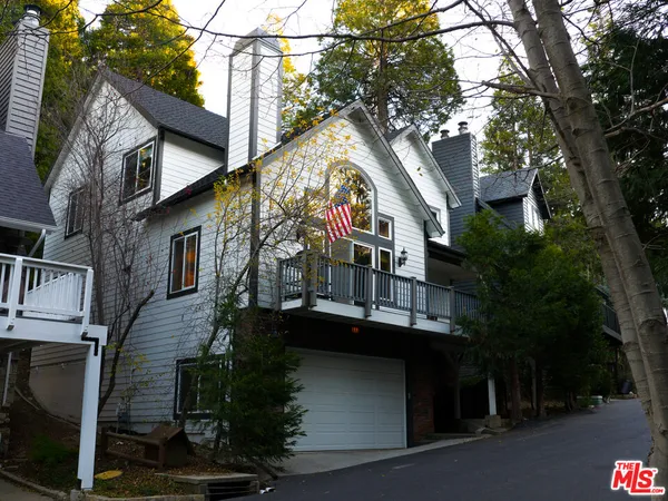 an aerial view of house with yard
