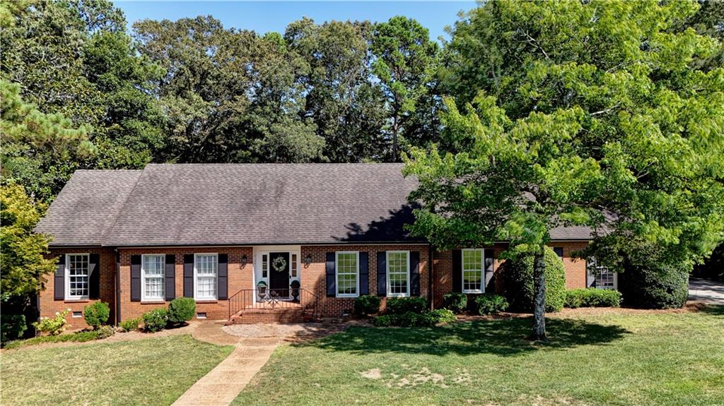 123 Saddle Mountain Road Southeast Rome, GA 30161 - Photo 1 of 1 front view of a house with a yard